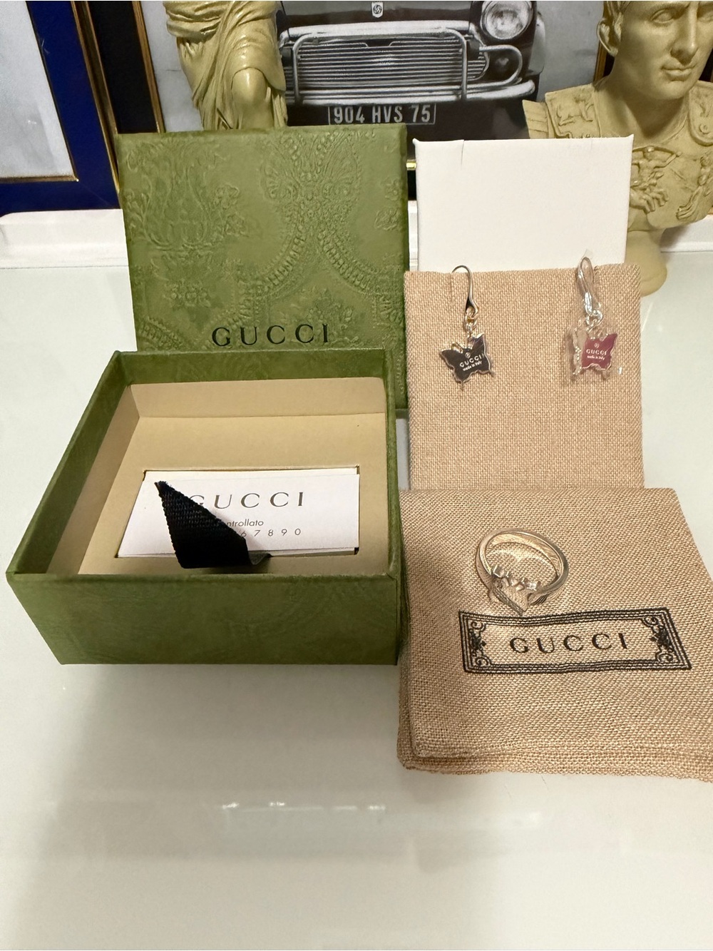 Authentic Gucci set earrings and matching ring size 8.with the box,dusty and COA